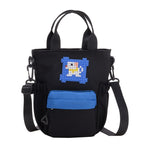 Mini handbag with colorful accents and practical carrying system