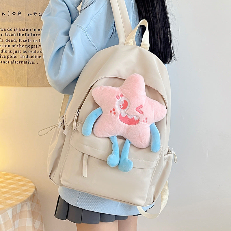 Plush backpack with playful star motif
