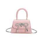 Women’s mini handbag with elegant chain closure