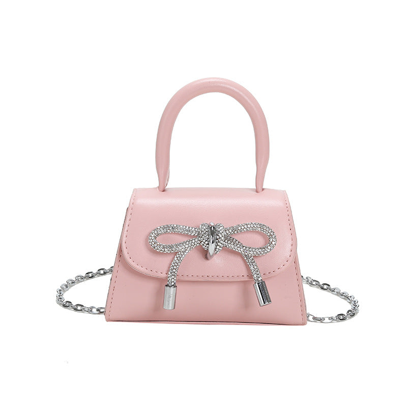 Women’s mini handbag with elegant chain closure