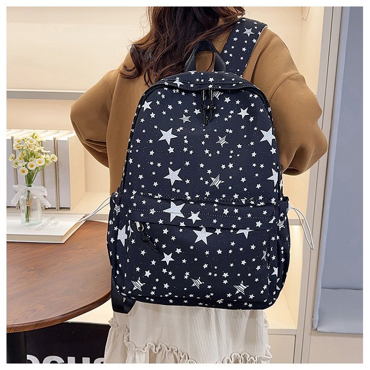 Backpack with Sparkling Star Motif and Charming Pendant