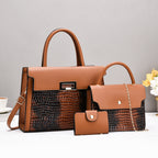 Ladies handbag set with luxurious crocodile leather look and removable clutch