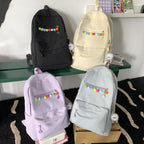 Practical backpack with colorful applications
