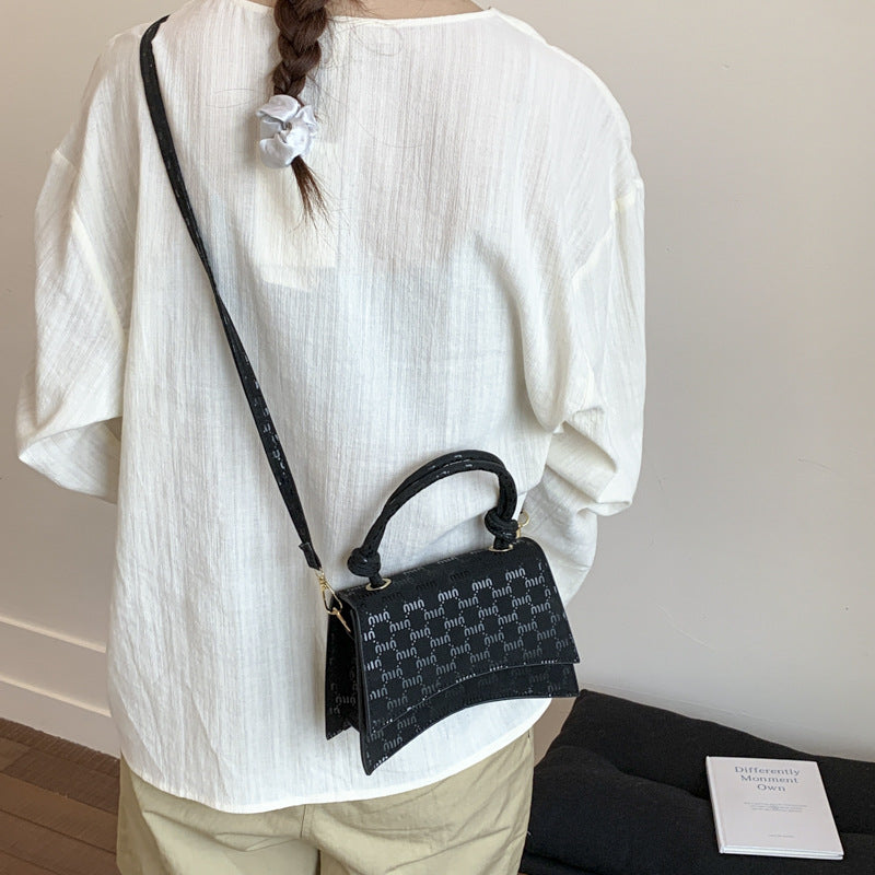 Ladies Mini-Handbag with sophisticated logo design