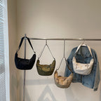 Practical shoulder bag with external zip pockets