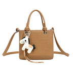Women's mini bag with animal charm and modern crocodile look