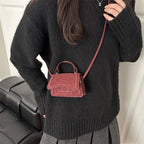 Ladies' mini handbag in retro style with removable shoulder strap