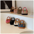 Women’s mini hobo bag made of textured synthetic leather with golden accents