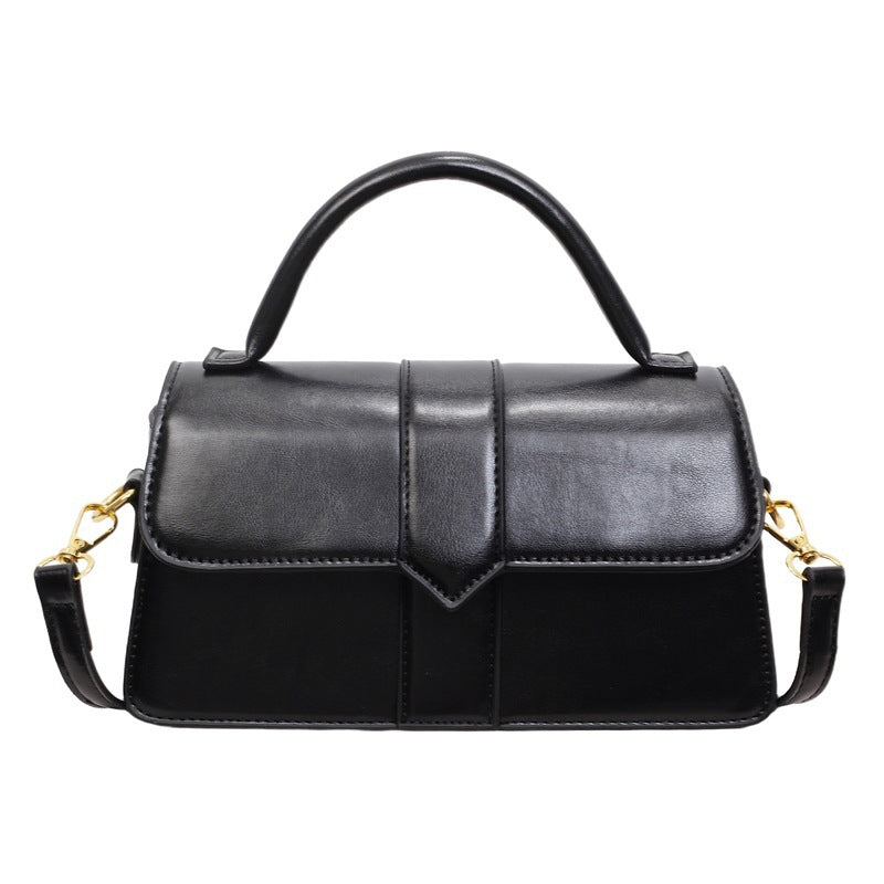 Women's leather handbag with detachable shoulder strap