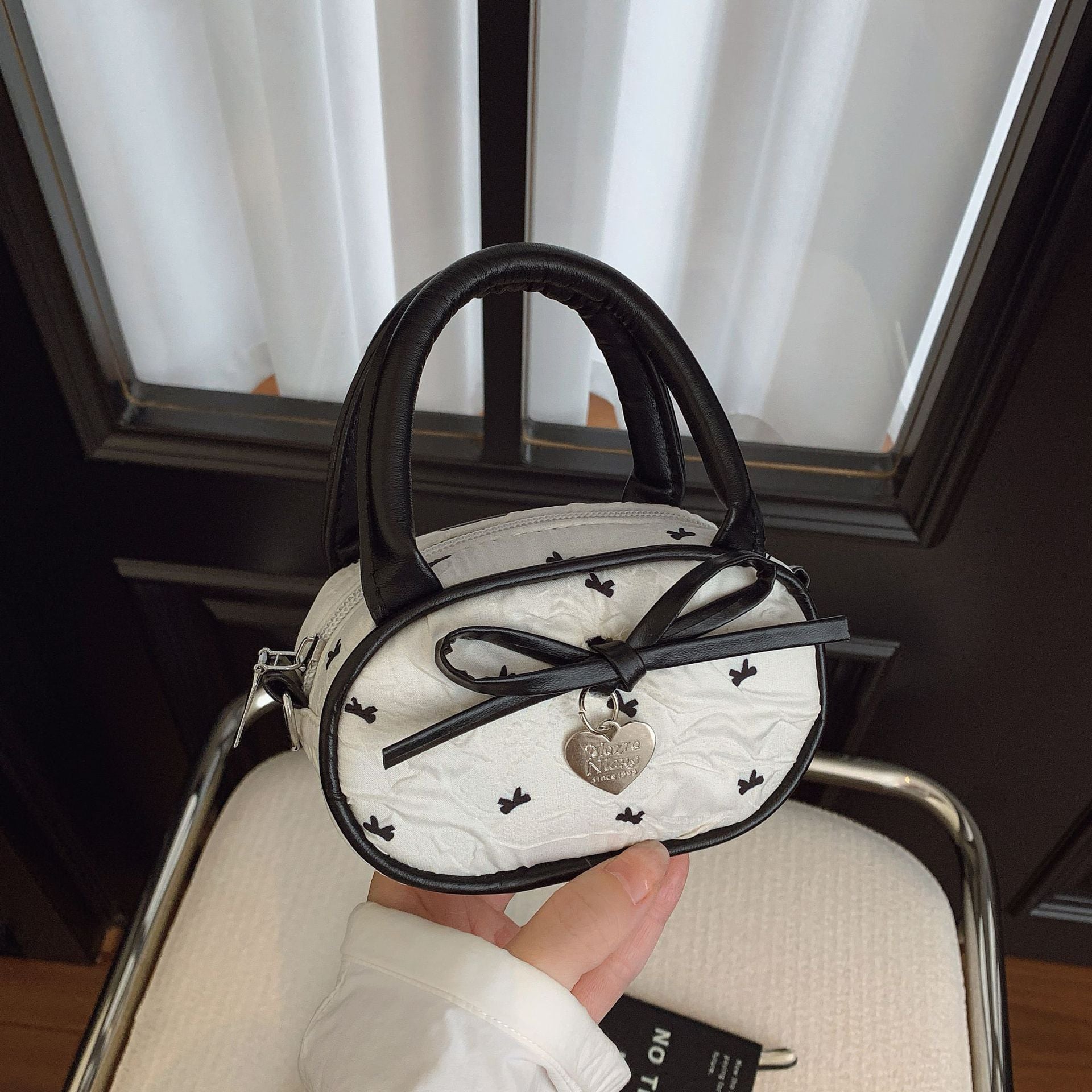 Quilted Mini Handbag with Heart Detail
