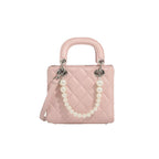 Ladies mini handbag with pearl-embellished chain and quilted design