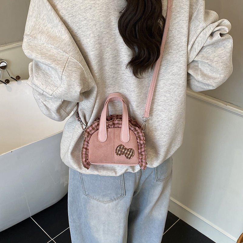 Women's Mini Hobo Bag with Playful Ruffle Design