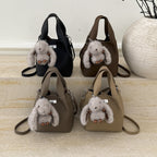 Women's mini handbag with detachable plush charm