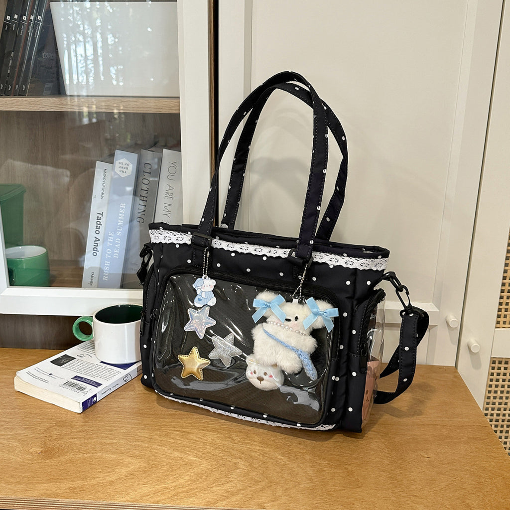 Handbag with Transparent Compartment Division and Playful Application Design