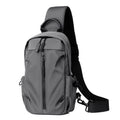 Sling backpack with multiple compartments