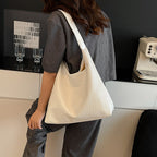 Sleek Textured Leather Hobo Handbag