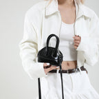 Ladies mini handbag with elegant glossy finish and removable shoulder strap