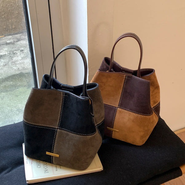 Women’s mini hobo bag made of high-quality suede leather with decorative stitching