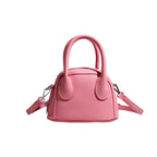 Women's mini handbag with structured exterior and detachable shoulder strap