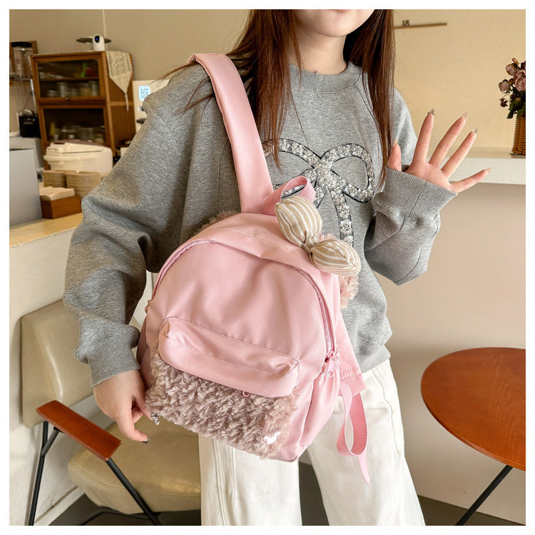 Plush backpack with high-quality surface structure