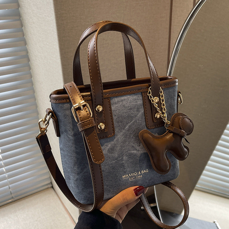 Women's mini handbag with removable charm