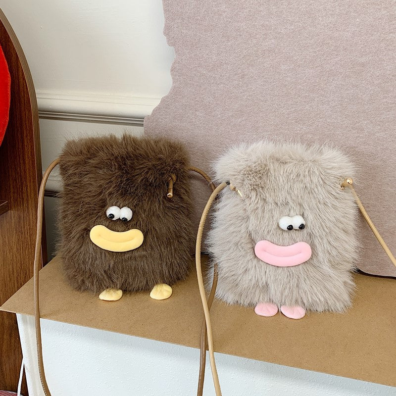 Plush shoulder bag with unique character design