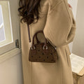 Women’s mini handbag made of high-quality material with a textured surface