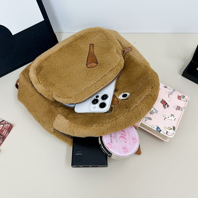 Plush children's backpack with cute monkey design