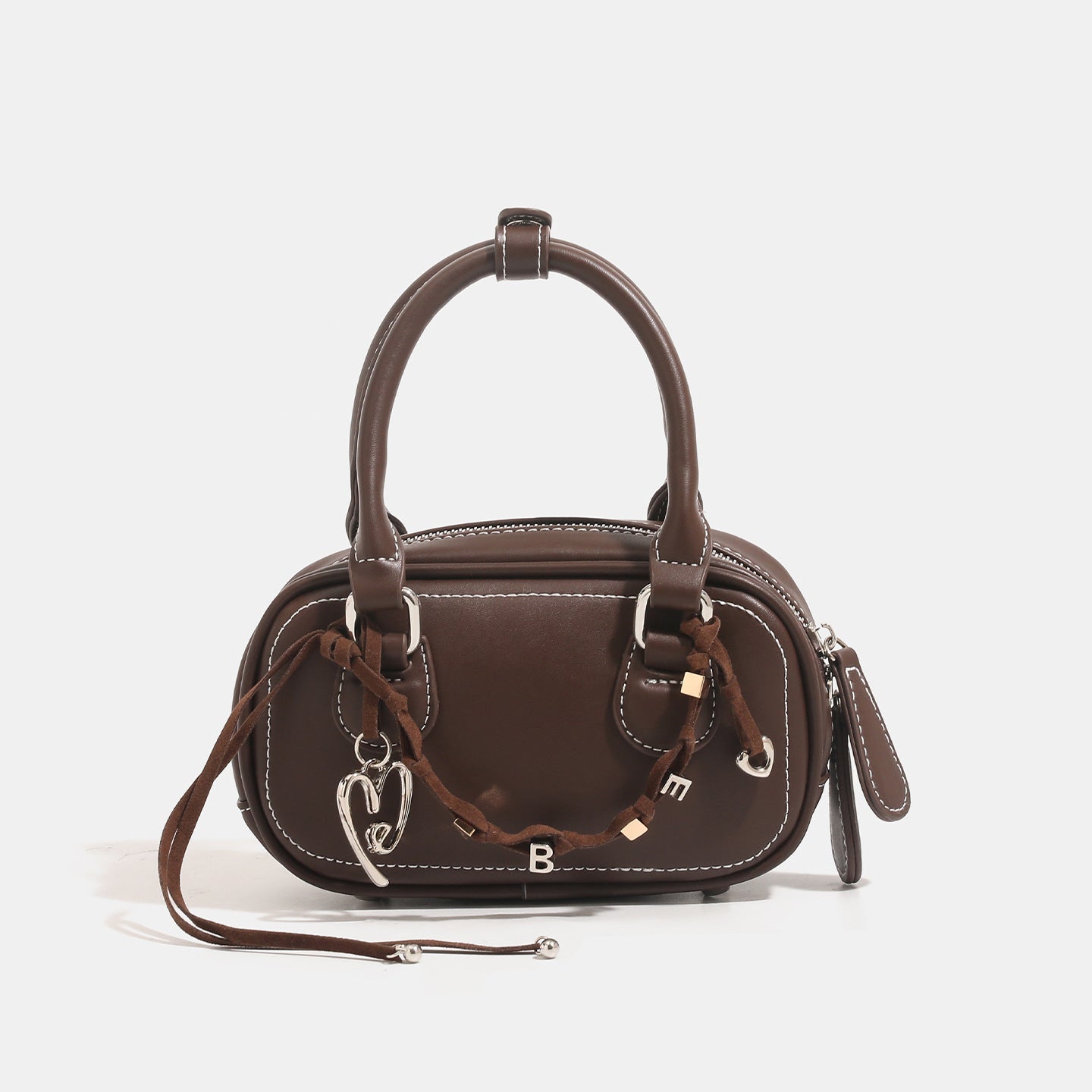 Women's mini handbag with playful drawstring and elegant accents