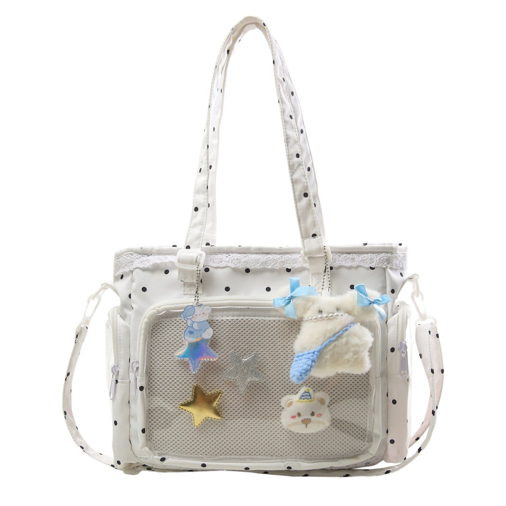 Handbag with Transparent Compartment Division and Playful Application Design