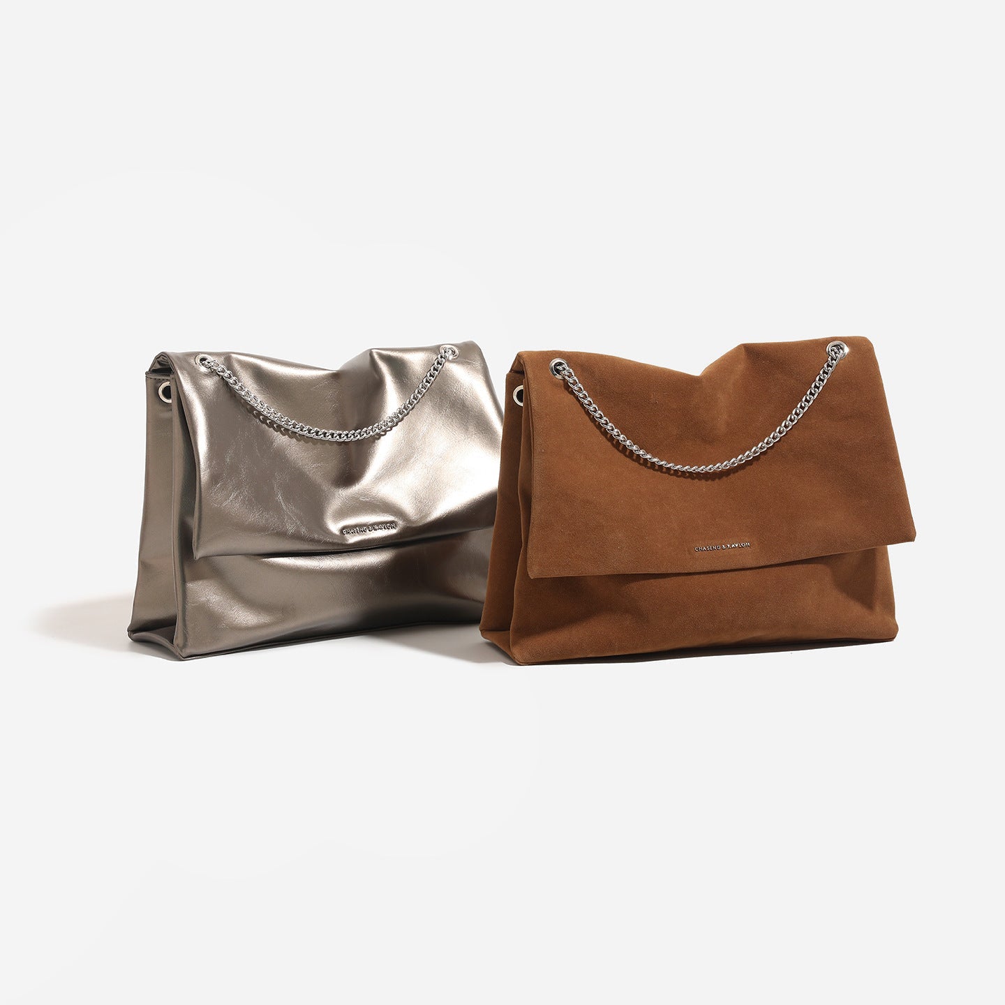 Women's clutch bag made of shiny synthetic leather with decorative chain strap