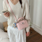 Women’s mini handbag with cute animal pendant