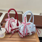 Women’s mini bag with playful design and charming details