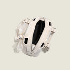 Women’s mini handbag with playful bow accent