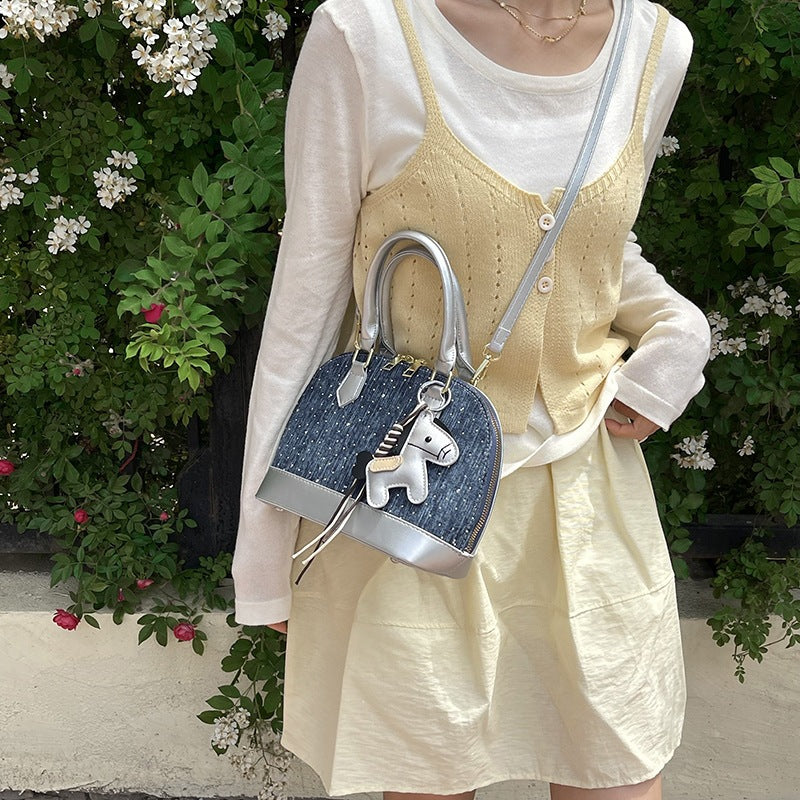 Women's mini handbag with animal charm and fashionable denim