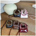 Women’s mini handbag with trendy ruffle design