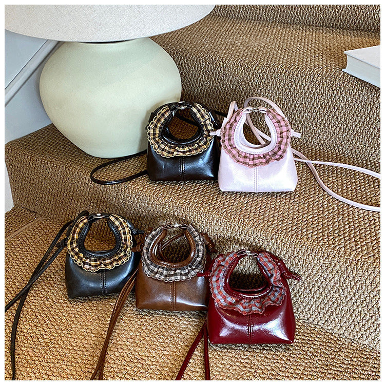 Women’s mini handbag with trendy ruffle design