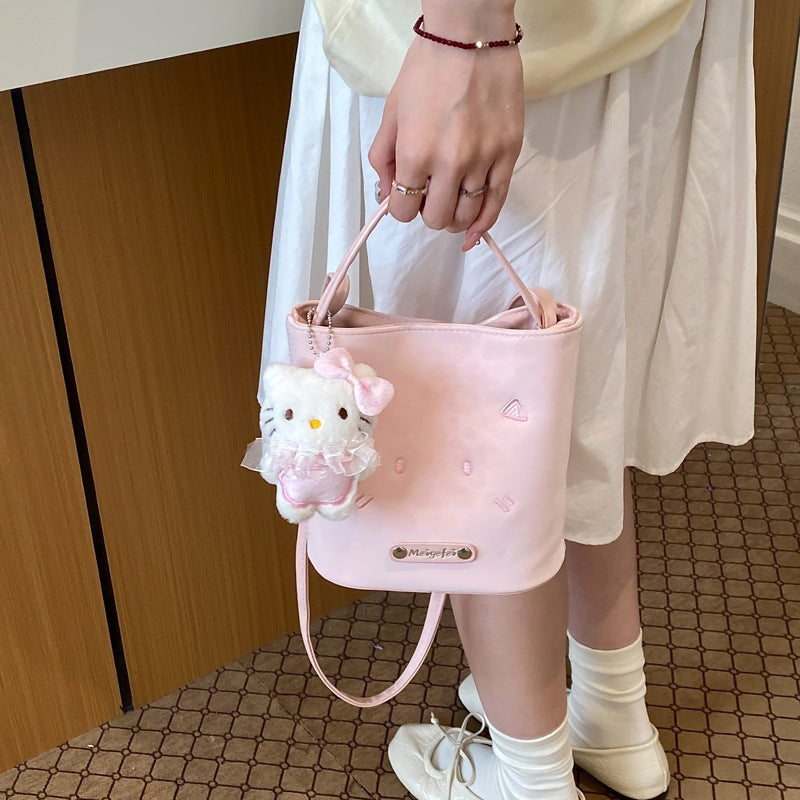 Women's mini bag with playful character
