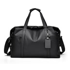 Travel bag with waterproof material and practical carrying options