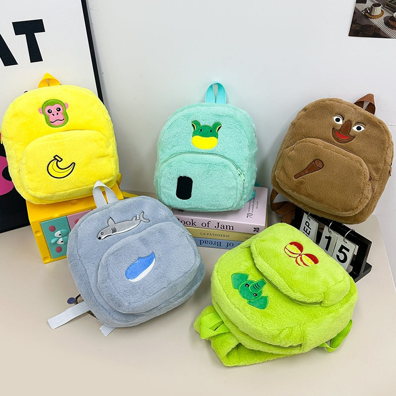 Plush children's backpack with cute monkey design