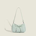 Ladies elegant mini handbag with playful drawstring