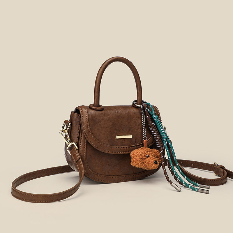 Women's mini handbag with playful detail and high-quality faux leather