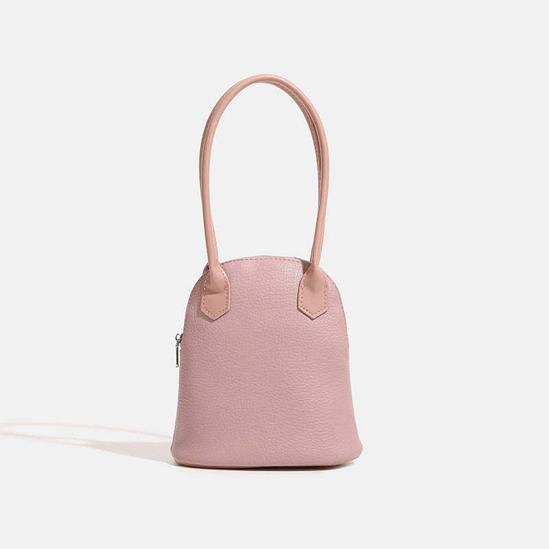 Women's mini handbag in modern design with practical zipper