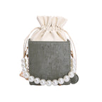 Ladies stylish mini handbag with drawstring and pearl accent