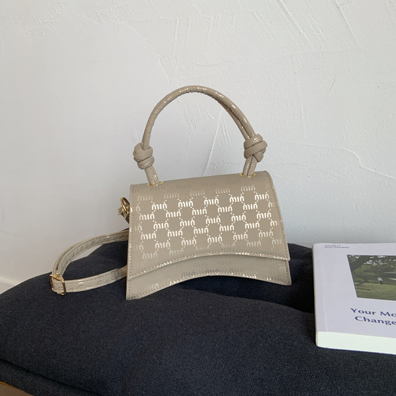 Ladies Mini-Handbag with sophisticated logo design