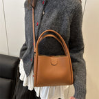 Ladies elegant mini handbag with practical flap closure