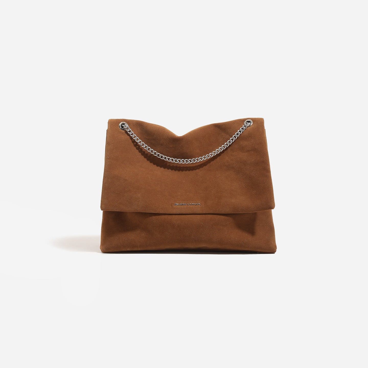 Women's clutch bag made of shiny synthetic leather with decorative chain strap