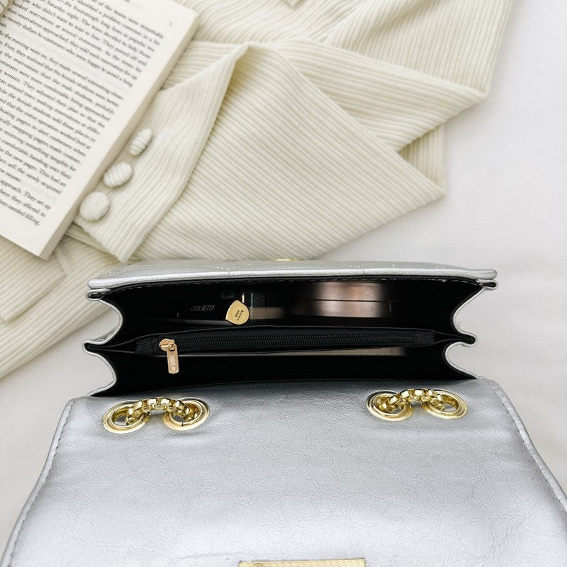 Ladies elegant wrist bag with coordinated mini wallet