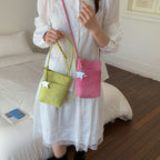 Fashionable shoulder bag with braided shoulder strap