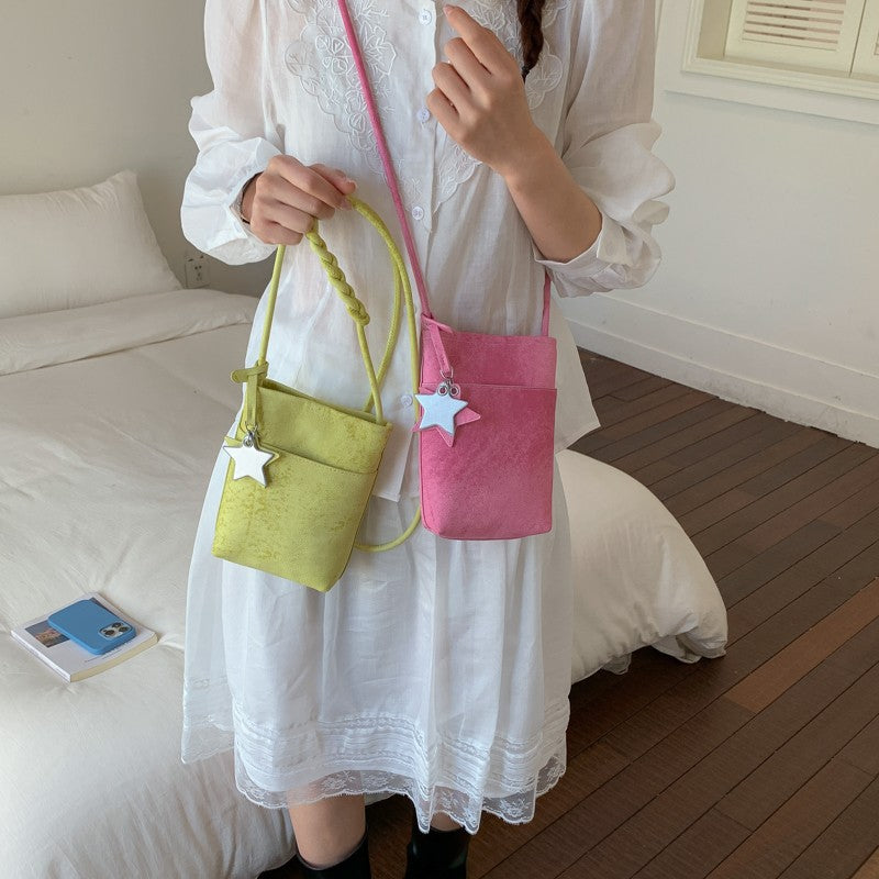 Fashionable shoulder bag with braided shoulder strap